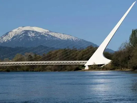 The Sundial Bridge over the Sacramento River in Redding with Mount Shasta behind